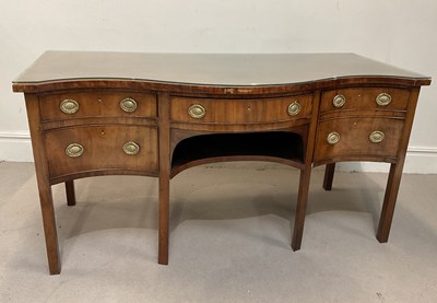 Lot 91 - A George III style mahogany serpentine front...