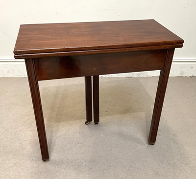 Lot 116 - A George III mahogany tea table with...
