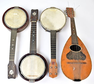Lot 633 - KEECH; two banjolele banjos, together with a...