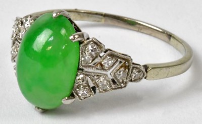 Lot 741 - A white metal Art Deco ring set with a central...