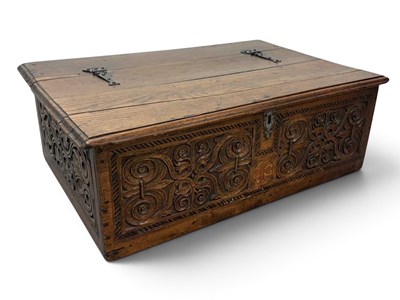 Lot 55 - A large 18th century carved oak bible box,...