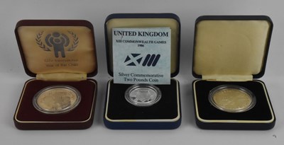 Lot 1732 - Three cased encapsulated silver proof coins,...