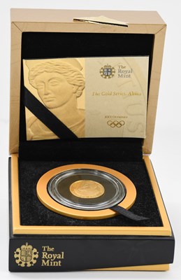 Lot 1606 - ROYAL MINT; a cased encapsulated gold proof...
