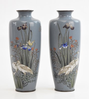 Lot 656 - A pair of Japanese cloisonné vases decorated...