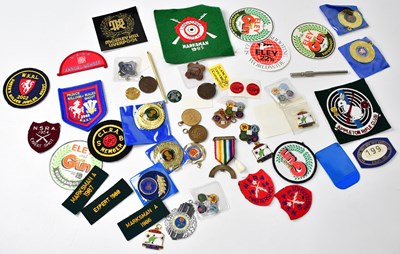 Lot 658 - A collection of 20th century shooting medals,...