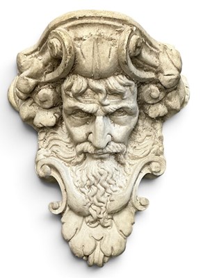 Lot 228 - A composite stone figural wall bracket...