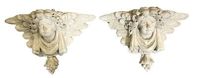 Lot 229 - A pair of modern composite stone figural wall...