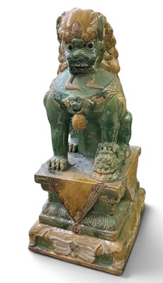 Lot 1026 - A large Chinese Sancai glazed porcelain figure...