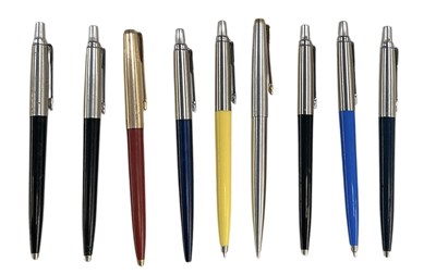 Lot 428 - PARKER; nine assorted push top ballpoint pens...