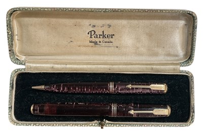 Lot 470 - PARKER; a cased 'Vacumatic' pen and pencil set,...