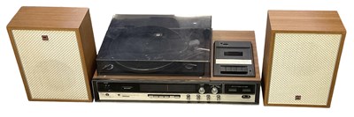 Lot 543 - SHARP; a mid century teak veneered hi-fi...