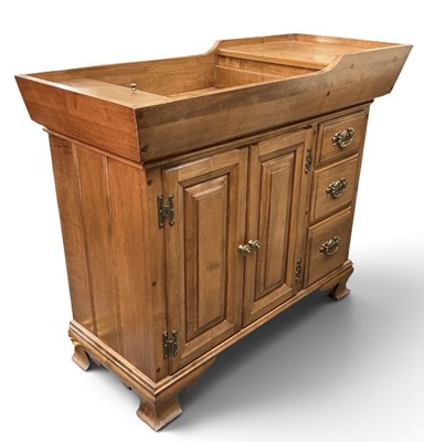 Lot 97 - An American reproduction maple hall cabinet,...