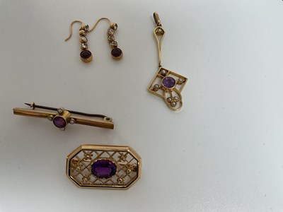 Lot 567 - A 9ct yellow gold and amethyst pierced...