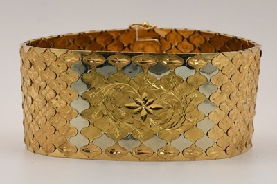 Lot 1532 - A substantial 18ct yellow and white gold cuff...
