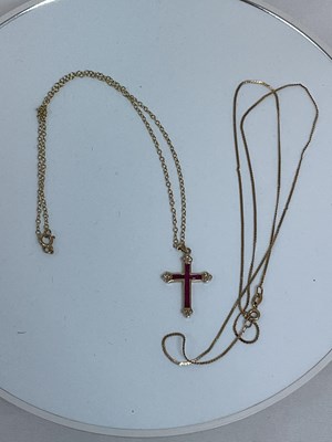Lot 570 - A 9ct yellow gold fine link chain suspending a...