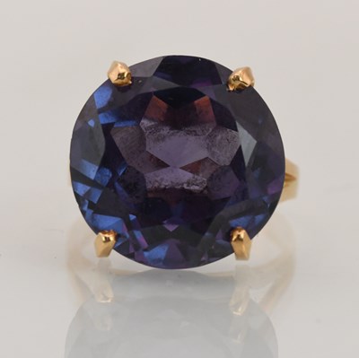 Lot 1385 - A yellow metal amethyst solitaire ring, the...