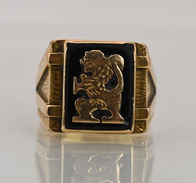 Lot 1364 - A substantial 18ct yellow gold onyx set signet...