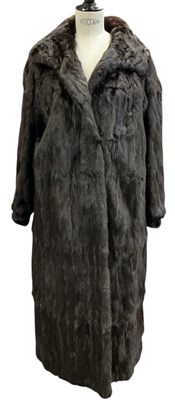 Lot 672 - A vintage brown mink fur coat, with brown silk...