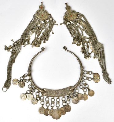 Lot 820 - Three pieces of Omani white metal jewellery,...