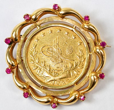 Lot 792 - An 18ct yellow gold brooch set with a Turkish...
