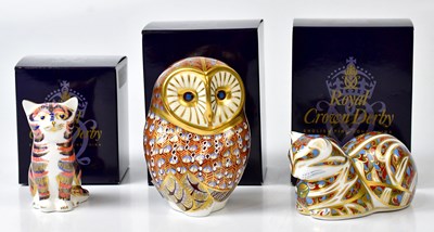 Lot 120 - ROYAL CROWWN DERBY; three boxed paperweights,...