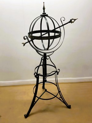 Lot 694 - A modern iron work armillary sphere, raised on...