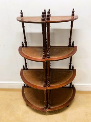 Lot 677 - A pair of modern four tier mahogany corner...