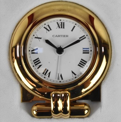 Lot 205 - MUST DE CARTIER; a boxed polished gold tone...