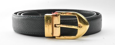 Lot 674 - LOUIS VUITTON; a lady's green snakeskin effect...