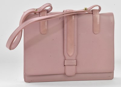 Lot 689 - MOSCHINO; a lady's pale pink leather evening...