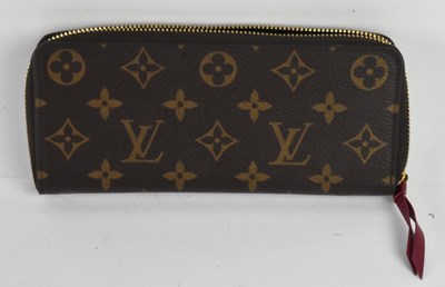 Lot 654 - LOUIS VUITTON; a lady's brown monogram leather...