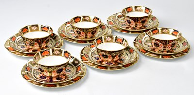 Lot 155 - ROYAL CROWN DERBY; a set of Imari cups and...