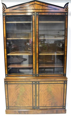 Lot 26 - A 19th century mahogany glazed bookcase, the...