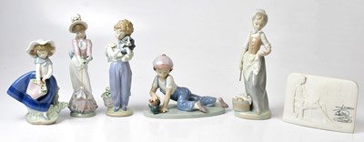 Lot 109 - LLADRÓ; four figures comprising 'Garden Song',...