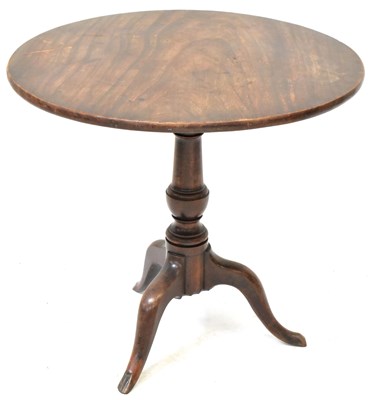 Lot 14 - A George III circular mahogany tilt-top table...