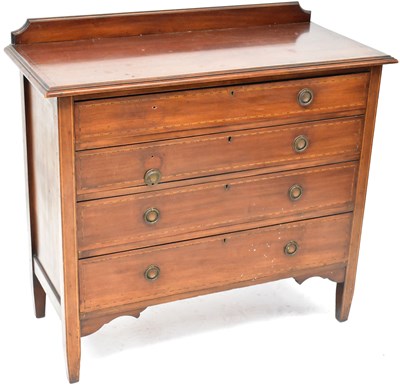 Lot 41 - An Edwardian mahogany chest of four long...