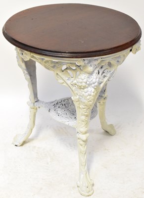 Lot 48 - A vintage cast iron pub table with grape and...
