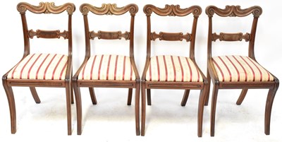 Lot 22 - Six Regency bar-back dining chairs on sabre...