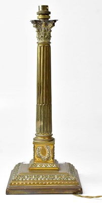Lot 63 - A brass table lamp in the form of a Corinthian...