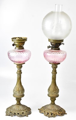 Lot 70 - A pair of reproduction oil lamps with...