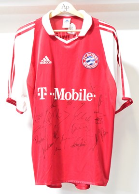 Lot 649 - BAYERN MUNICH FC; a team shirt signed by the...