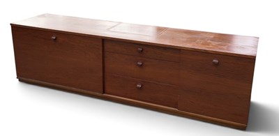 Lot 64 - AVALON; a teak mid century sideboard, with...