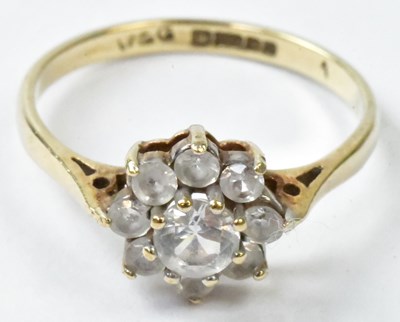 Lot 756 - A 9ct yellow gold floral cluster ring set with...