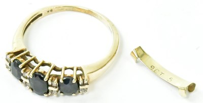 Lot 752 - A 9ct yellow gold ring set with three...