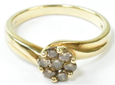 Lot 748 - A 9ct yellow gold floral cluster ring set with...