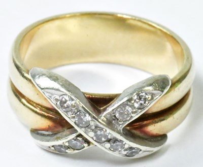 Lot 751 - A 9ct yellow gold ring set with tiny white...