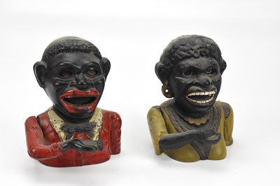 Lot 376 - Two cast iron money boxes, Jolly and Dinah,...