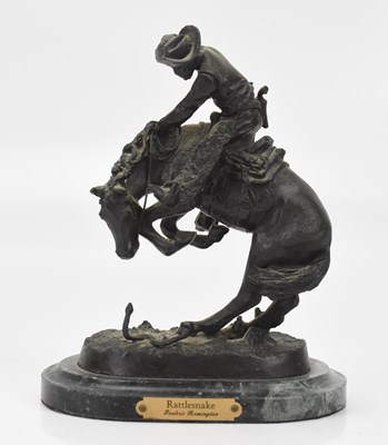 Lot 436 - AFTER FREDERICK REMINGTON; a small bronze...