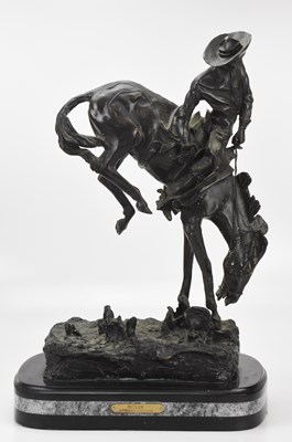 Lot 428 - AFTER FREDERICK REMINGTON; a large bronze...