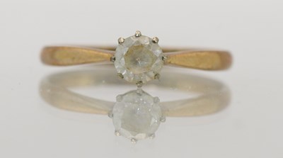 Lot 1432 - A 9ct yellow gold white stone set solitaire...